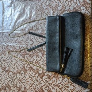 Black crossbody bag with tassels